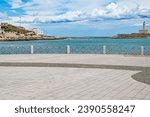 Seafront of Vieste, in the background on the right the characteristic lighthouse.