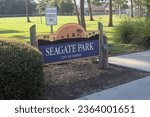 Seagate Park sign in Naples Florida at sunset.