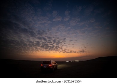 Sealine, Qatar, June 2021: Blue Hour Sky At Desert.