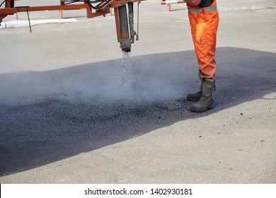 Sealing Of Asphalt Pits By Blowing Hot Mixture.