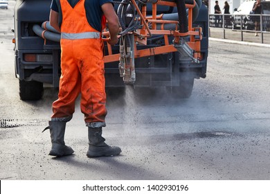 Sealing Of Asphalt Pits By Blowing Hot Mixture.