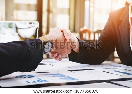Sealing a deal, Business man and woman handshake  to business  agreement.