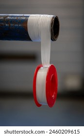 Sealing threads of the BSP thread, NPT thread or metric type with Teflon tape on a tube or pipe in an industrial environment, the Netherlands