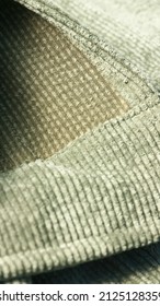 Seam In Green Corduroy Fabric