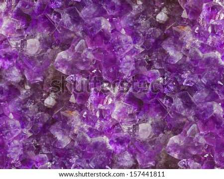 Seamless amethyst crystal background.
