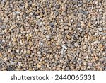Seamless background ot texture made of multicolored pebbles