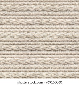 Seamless Beige Knitwear Fabric Texture with Pigtails. Repeating Machine Knitting Texture of Sweater. Beige Knitted Background. - Shutterstock ID 769150060