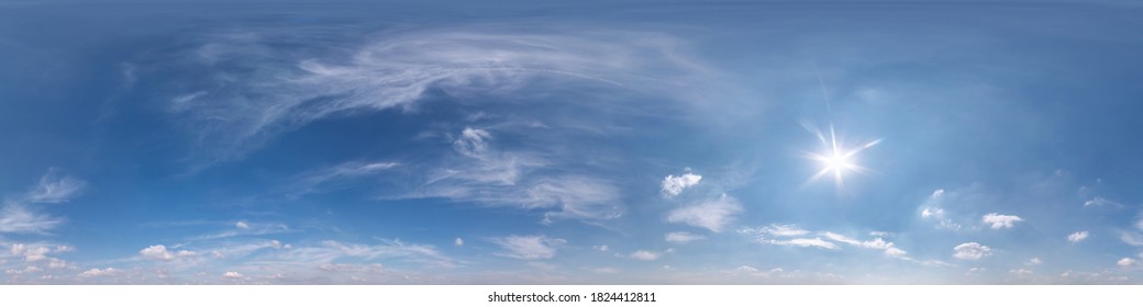 Seamless clear blue sky hdri panorama 360 degrees angle view with beautiful clouds  with zenith for use in 3d graphics or game as sky dome or edit drone shot