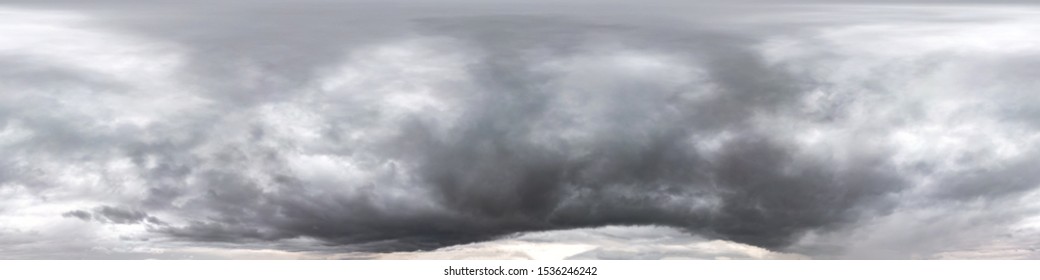Seamless cloudy dark sky before storm hdri panorama 360 degrees angle view with beautiful clouds  with zenith for use in 3d graphics as sky dome or edit drone shot