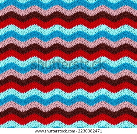 Seamless crochet zigzag pattern is crocheted with bright contrasting threads. Acrylic baby yarn. African style.