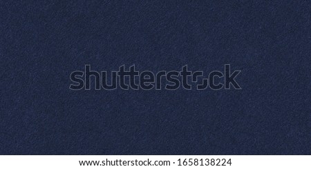 Seamless dark blue felt background texture. Surface of  blue fabric high resolution. Wide panoramic banner.