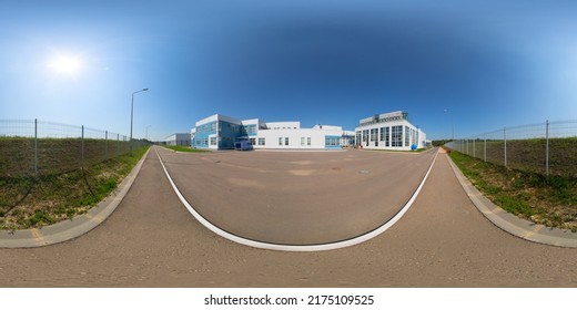 Seamless full spherical 360 degree panorama in equirectangular projection of outdoor industrial area with white buildings and metal mesh fence and aphalt ways at sunny summer day - Shutterstock ID 2175109525