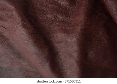 Seamless genuine natural dark brown leather texture background, old vintage real leather. - Shutterstock ID 571580311
