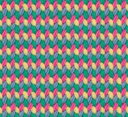 Seamless Knitted Pattern Crocheted From Bright Acrylic Yarn. Texture In The Form Of Multi-colored Stitches. Complementary Color Combination.