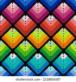 Seamless knitted pattern in the form gradient rhombuses is crocheted and multi  colored threads  Patchwork style  Rainbow color combinations 