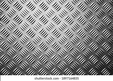 Seamless metal floor plate with diamond pattern, anti slip stainless steel sheet and plate, ribbed metal sheet, silver metal grip texture, aluminum notched sheets. - Shutterstock ID 1897164835