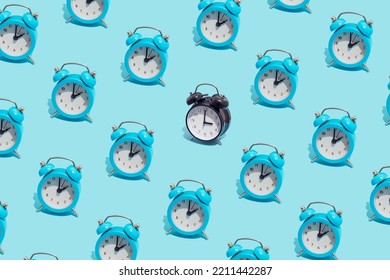 Seamless Pattern Of Blue Retro Alarm Clocks  Show 2 O'clock And One Black Shows 3. Changing Clock From Summer Time To Winter Time. Shifting The Clock Hands Back In Autumn.