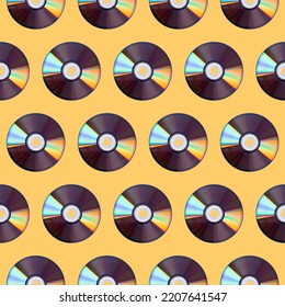 Seamless Pattern Of CD Disks On A Yellow Background, Retro Devices.