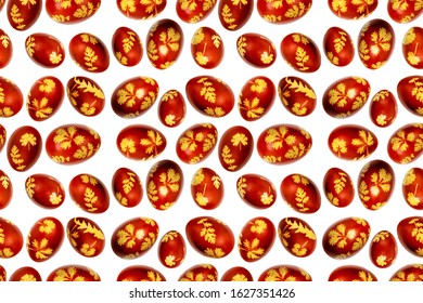 Seamless pattern of easter eggs dyed with onion husk with imprint of fresh spring leaves isolated on white background. Creative decoration. Easter traditions concept. Closeup