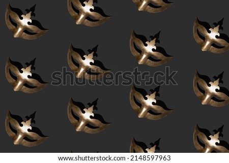 Seamless pattern made of metallic gold masquerade mask on black background. Isometric view. Carnival or Masquerade concept.