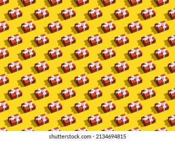 Seamless pattern made of red gift boxes tied with white ribbons on yellow background. Creative Christmas pattern from Gift box. Christmas isometric pattern. Holiday concept, congratulations