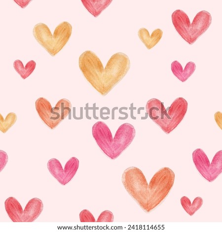 seamless pattern with multi-colored hearts on a light pink background