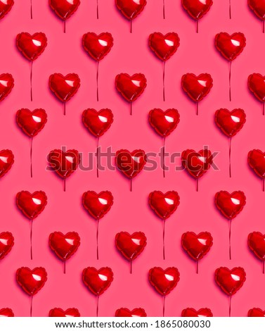 Seamless Pattern of Red balloon in the shape of heart on pink background top view flat lay copy space. Love concept. Holiday Object, Birthday, Valentine's Day, Wedding. Party decoration. Greeting card