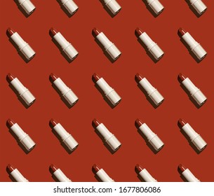 Seamless Pattern Red Creme Bullet Lipstick .