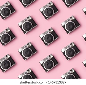 Seamless Pattern With Vintage Instant Camera At Pastel Pink Background. Trendy Film Photo Cam Top View