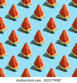 Seamless pattern with watermelon slice on blue background.