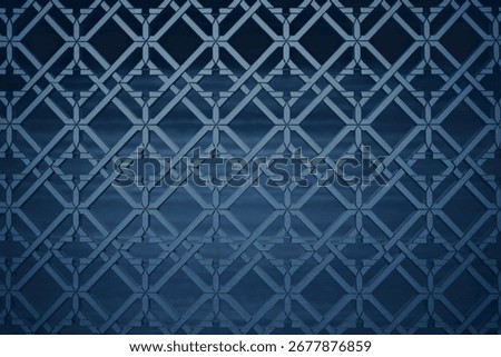 A seamless, repeating geometric pattern featuring interlocking diamonds and lines in varying shades of dark blue, creating a textured effect.