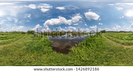 Similar – a tideway leads through the blooming salt marshes on Hallig Gröde