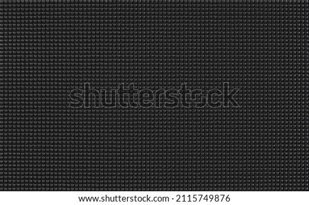 Seamless texture background, black nylon surface, durable weaving threads, close-up