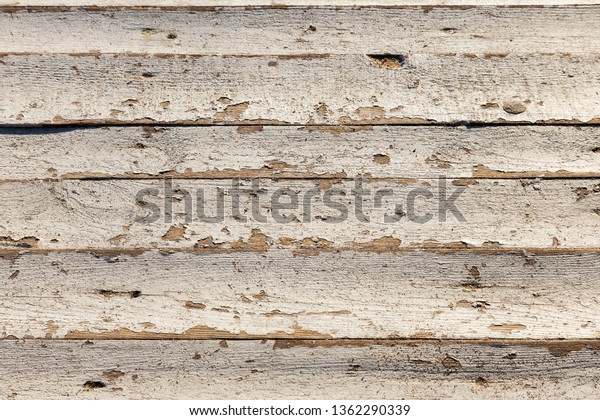 Seamless texture\
background, boards natural old painted white. White wood pattern\
and texture for background. Close-up image. Rustic background. Old\
wood background