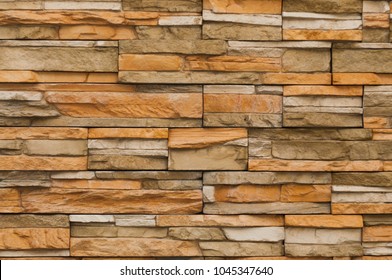 Seamless texture, background, stone lined with granite walls. sandstone. stone background wall. Facing Stone