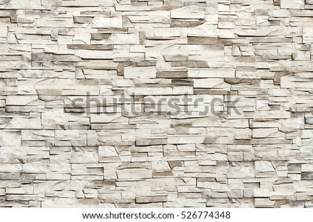 Seamless texture, background, stone lined with granite walls. sandstone. stone background wall.  Facing Stone