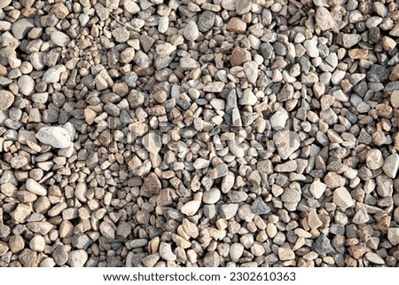 Seamless texture of gravel in HDR mode for game design.