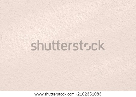 Seamless texture of pacific pink cement wall a rough surface, with space for text, for a background..	