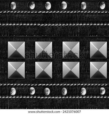 Seamless texture photo of black leather stitched belt with rivets and spikes.