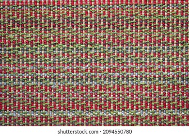 Seamless Texture Of Warm Woolen Multicolored Rug Pattern Wallpaper Background. Green, Red, Gray, Blue And White Color Thread.