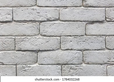 Seamless texture of white decorative stacked stone, natural stone cladding. brick background. close up. Background