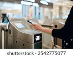 Seamless Travel Experience: Scanning Mobile Device at Airport Turnstile  