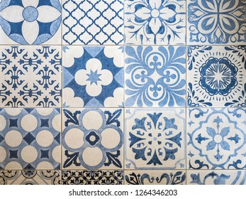 Seamless vintage Portuguese style pattern on floor tiles with blue color.