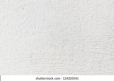 Seamless white painted concrete wall texture/background.