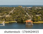 Seaplane flying above Tavares Pavilion 