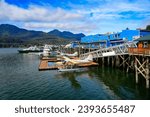 Seaplane moored in the waters of the Gastineau Channel in downtown Juneau - Floating pontoon serving as a floating airport for scenic flights over the glaciers of Juneau