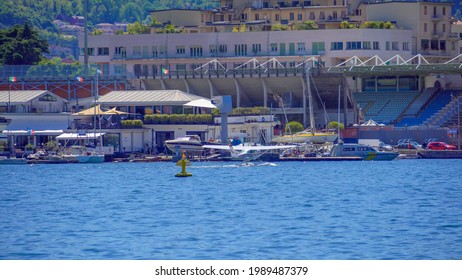 Seaplane. Ultralight Aviation In Europe. Lake. Hobbies And Sports. Tourism. Paroplane. Hydroplane. Airplane In The Air And On The Water. ITALY, Como, June 2021 