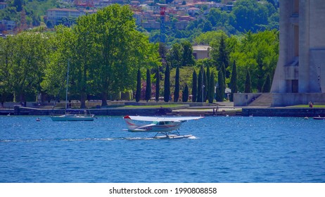 Seaplane. Ultralight Aviation In Europe. Lake. Airplane In The Air And On The Water. ITALY, Como, June 2021 