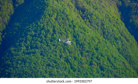 Seaplane. Ultralight Aviation In Europe. Lake. Hobbies And Sports. Tourism. Paroplane. Hydroplane. Airplane In The Air And On The Water. ITALY, Como, June 2021 