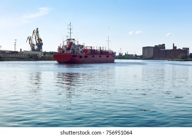 Seaport on the Baltic Sea, Kaliningrad. Commercial port. Port cranes and machinery.
